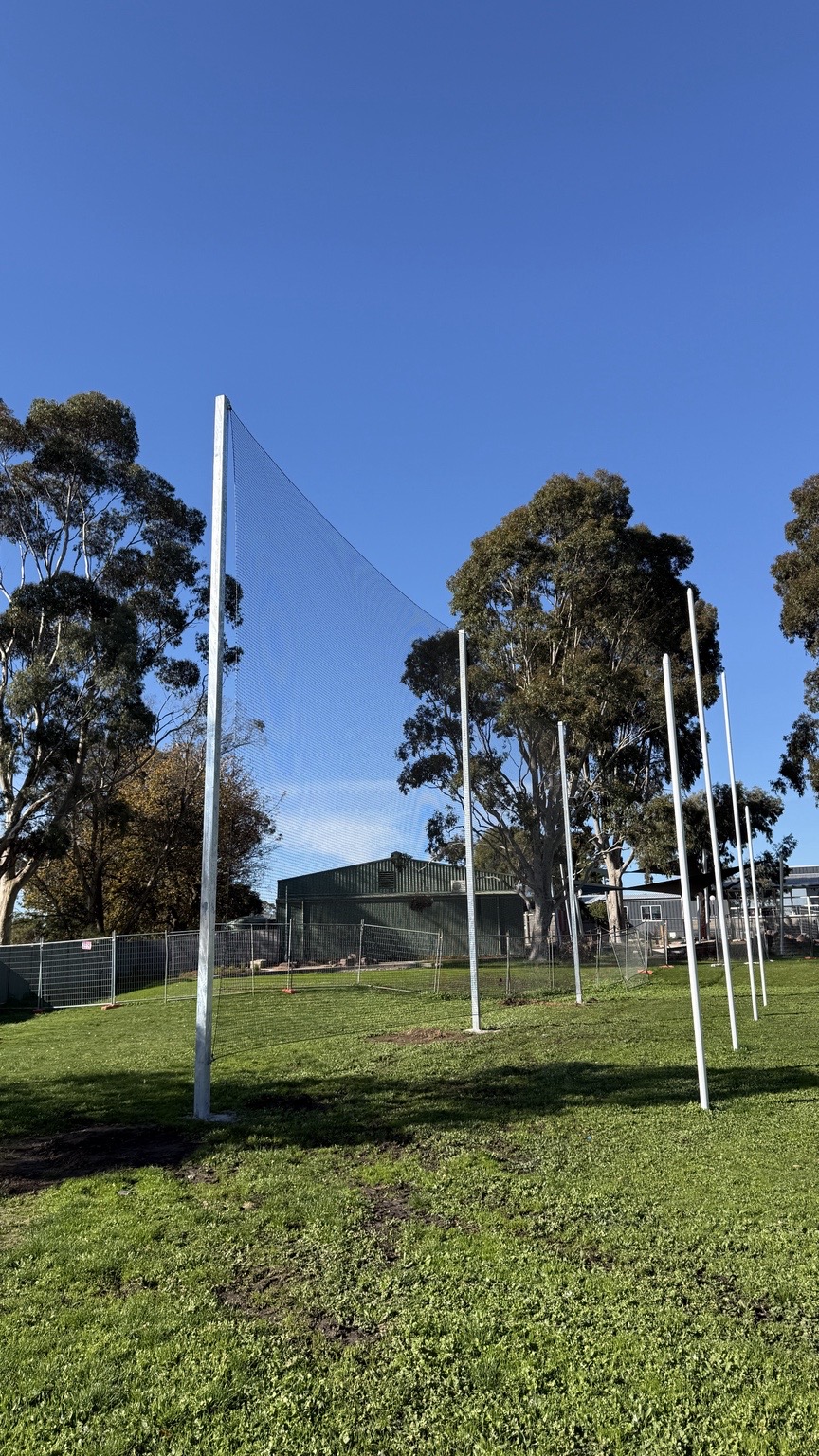 A completed premium goal net installation around an Australian sports oval